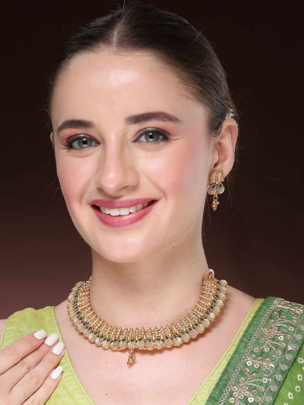 NVR Women's Gold-Polished Green Stone Studded Handcrafted Temple Jewellery Set