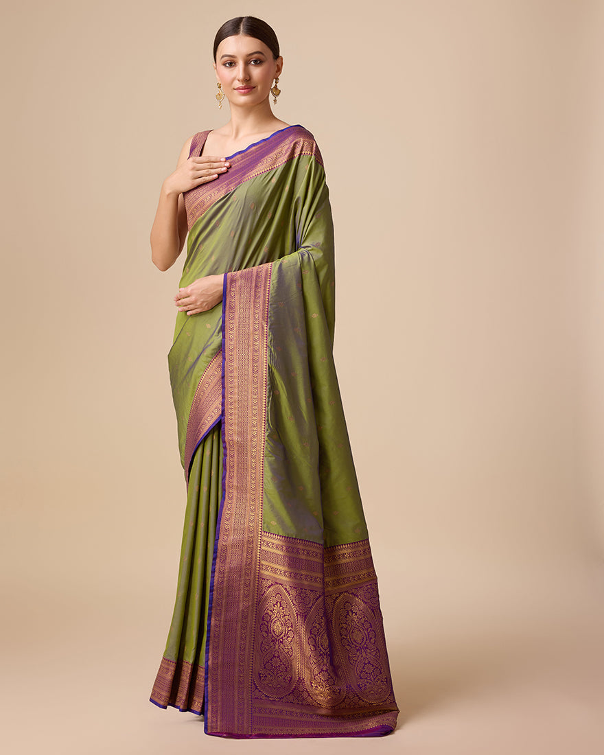Monjolika Fashion Elegant Olive Green Banarasi With Intricate Zari Work With Rich Brocade Patterns Silk Saree