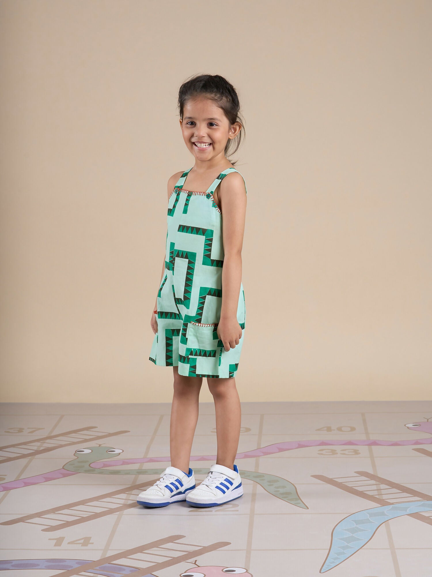 Snakes and Ladders Girls Green Table Print Jumpsuit from Siblings Collection