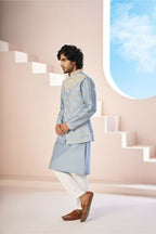 A Powder Blue Floral Hand Embroidered Nehru Jacket by Hilo Design