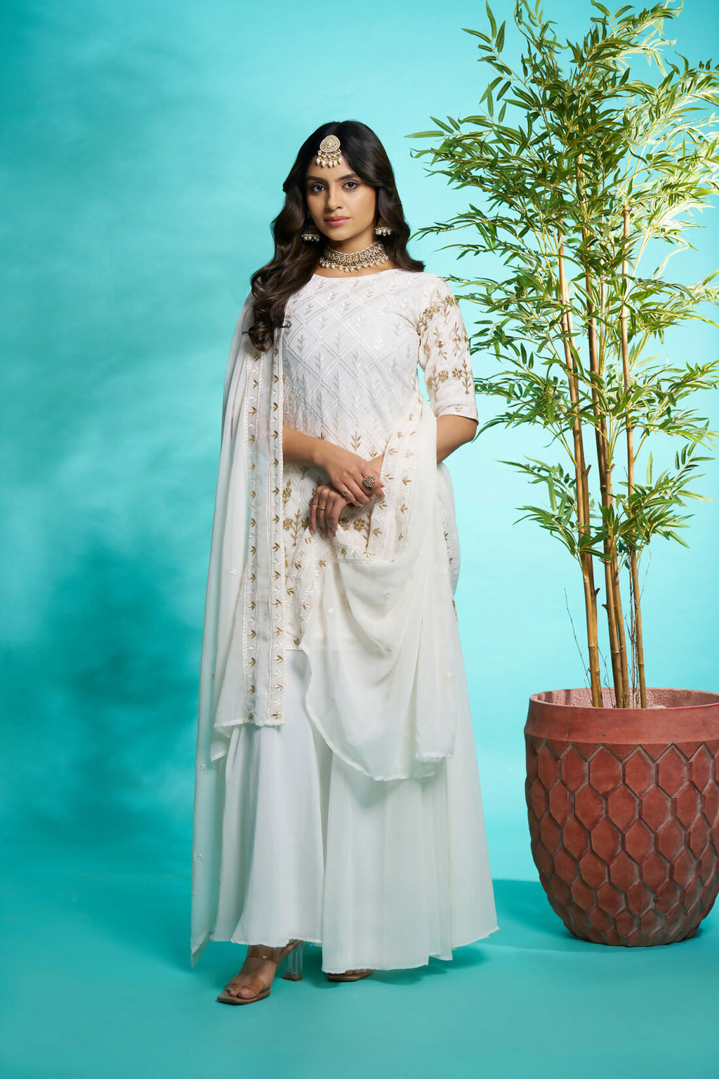 Aayaa Designer Faux Gorgette Embroidery Zari Sequins Thread work Full Flaired plazzo Suit with Dupatta - Off White