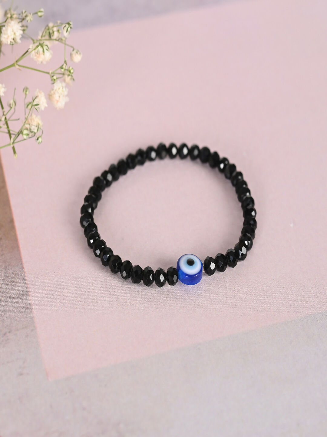 NVR Women & Men Black Evil Eye Elasticated Rakhi With Roli Chawal - Distacart