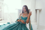 Eilara Beautiful Teal Net With Embroidered And Thread Zari Sequence Wedding Lehenga Choli