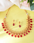 VOJ Gold-Polished Traditional Maroon Stone Studded Necklace And Earrings Set