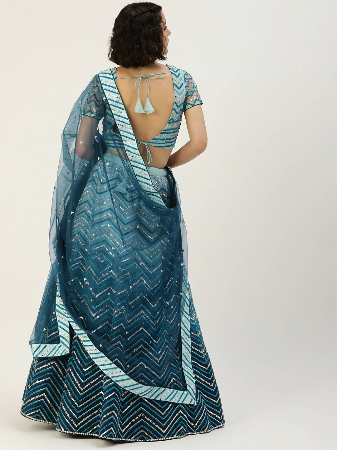 House of Panchhi Women Teal shading Net Mirror Embroidered Lehenga & Blouse with Dupatta