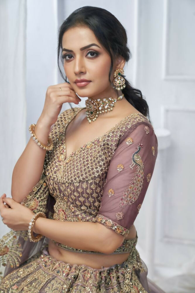 Kesar Fab Purple Net Embroidered Lehenga