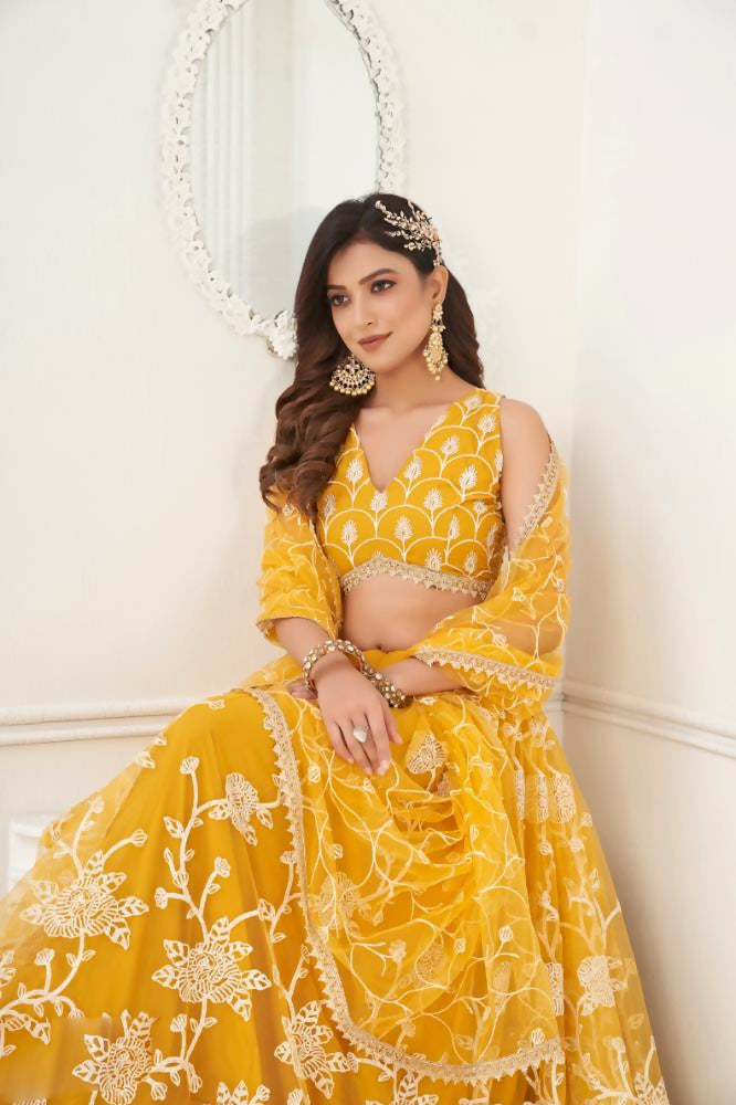 Aastha Fashion Mustard Yellow Butterfly Net White Cotton Thread Work And Sequence Work Embroidery Wedding Wear Lehenga Choli