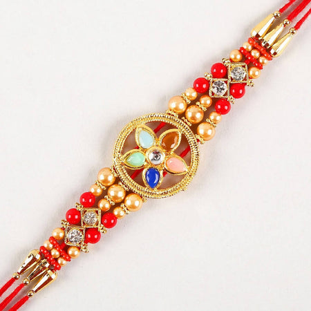 Flower Design Kundan Rakhi and Kaju Rolls Box