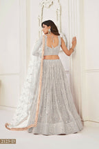Eilara Glamorous Off White Net With Sequins And Thread Embroidery Real Mirror Work Lehenga Choli For Wedding