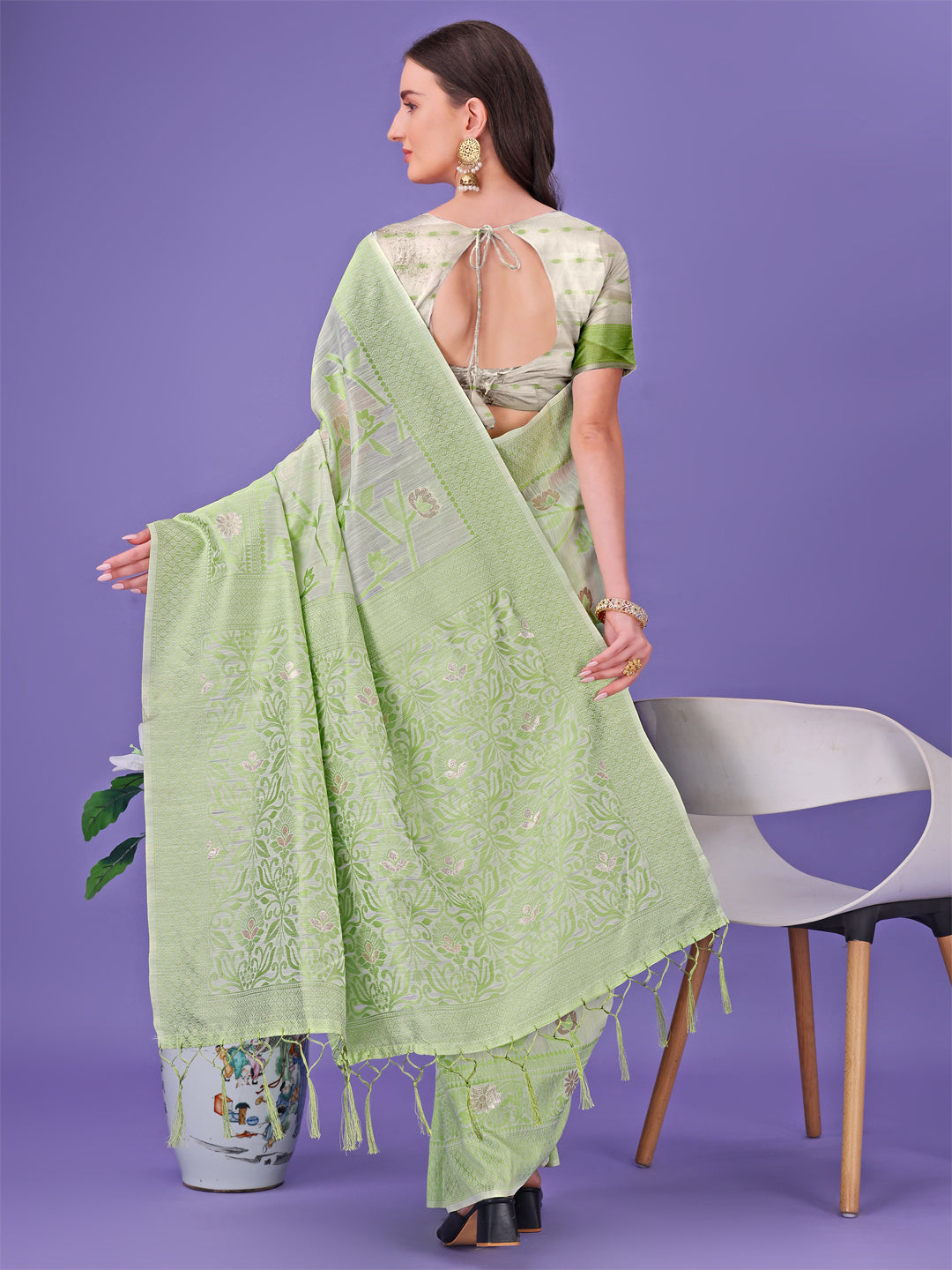 Shree Shyam Fashion Light Green Lichi Silk Saree with Floral Weaving & Tassel Pallu - Elegant Festive & Party Wear Saree