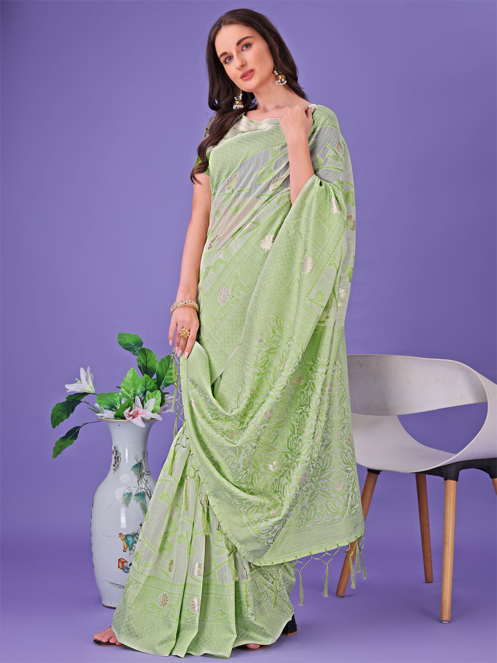 Shree Shyam Fashion Light Green Lichi Silk Saree with Floral Weaving & Tassel Pallu - Elegant Festive & Party Wear Saree
