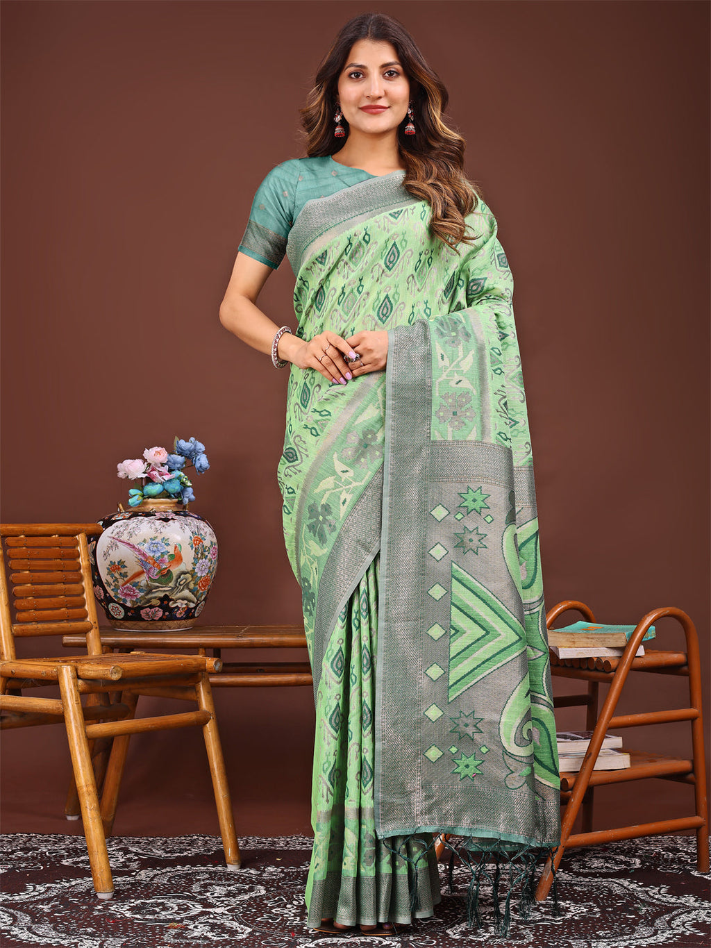 Shree Shyam Fashion Grace in Every Thread: Light green Patola Linen Cotton Saree Woven with Cultural Elegance