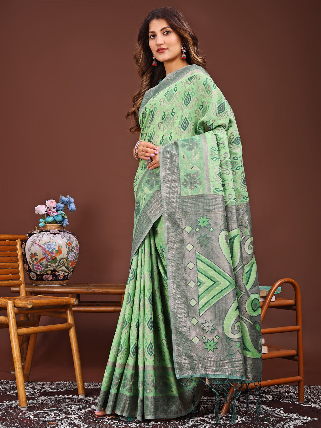 Shree Shyam Fashion Grace in Every Thread: Light green Patola Linen Cotton Saree Woven with Cultural Elegance