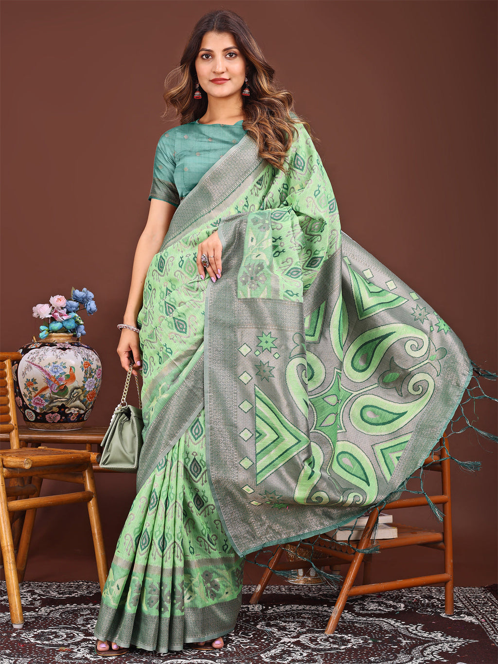 Shree Shyam Fashion Grace in Every Thread: Light green Patola Linen Cotton Saree Woven with Cultural Elegance