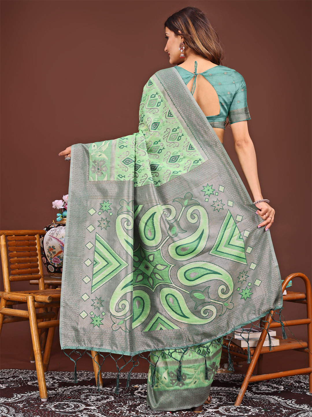Shree Shyam Fashion Grace in Every Thread: Light green Patola Linen Cotton Saree Woven with Cultural Elegance