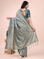 Shree Shyam Fashion Graceful Green Lichi Silk Saree with Contrast Blue Woven Border & Floral Zari Design - Wedding & Festive Wear