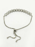 NVR Women Silver-Plated Handcrafted American Diamond Link Bracelet - Distacart