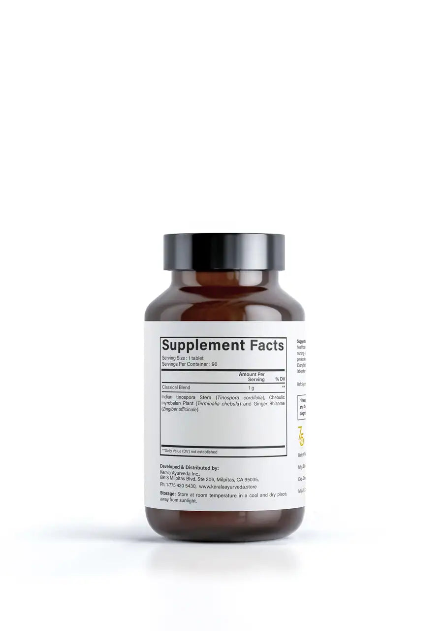 A bottle of Amruthotharam Kwath tablets by Kerala Ayurveda, labeled as maintaining healthy metabolism with 90 tablets inside along with supplement facts and ingredients