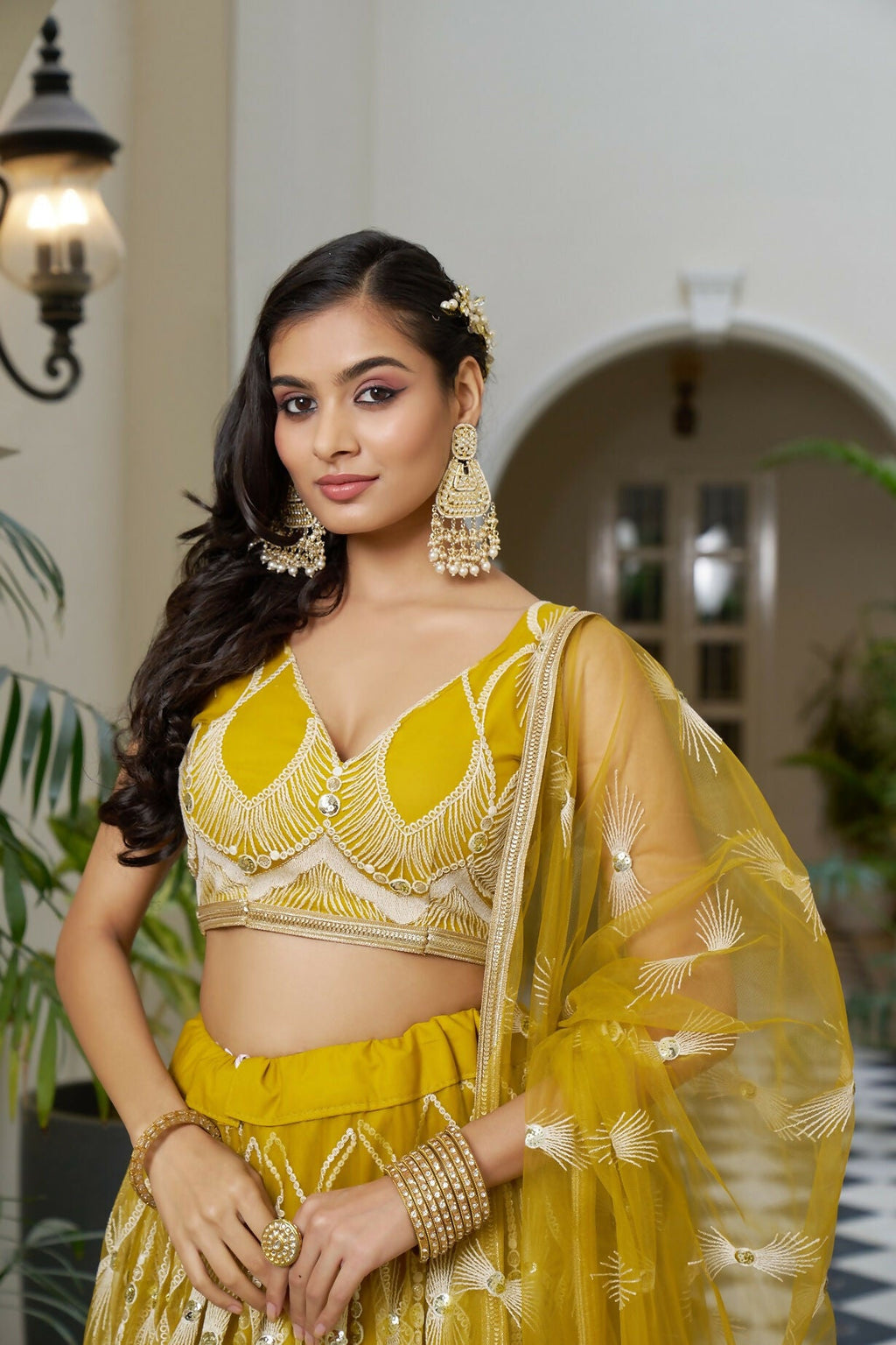 Eilara Glamorous Mustard Yellow Butterfly Net With Tone To Tone Thread And Sequence Embroidered Work Lehenga Choli For Wedding