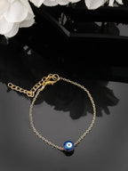 NVR Women Gold-Toned Evil Eye Rakhi With Roli Chawal - Distacart