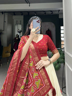 Lorenvalley Offwhite and Red Tussar Silk Patola Print Lehenga Choli