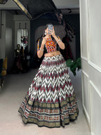 Lorenvalley Tussar Silk Black Leheriya Print with Foil Print and Paper Mirror Work Lace Lehenga Choli with Dupatta