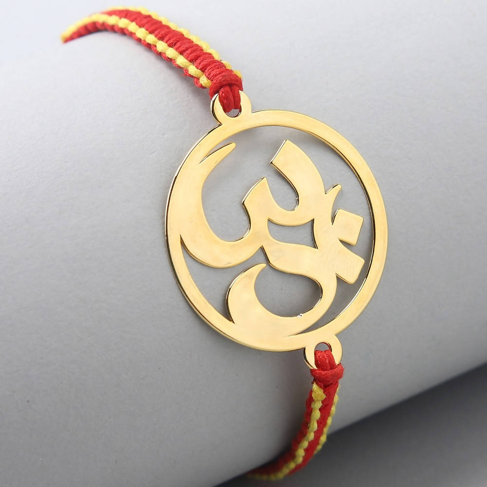 Ethnic Om Metal Rakhi & Dairy Milk Chocolates - Distacart
