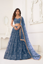 Eilara Glamorous Turquoise Net With Sequins And Thread Embroidery Real Mirror Work Lehenga Choli For Wedding