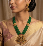 Jewel City Antique Gold-Plated Lakshmi Long Haram Set with Green Beads & Jhumkas – Traditional Temple Jewelry