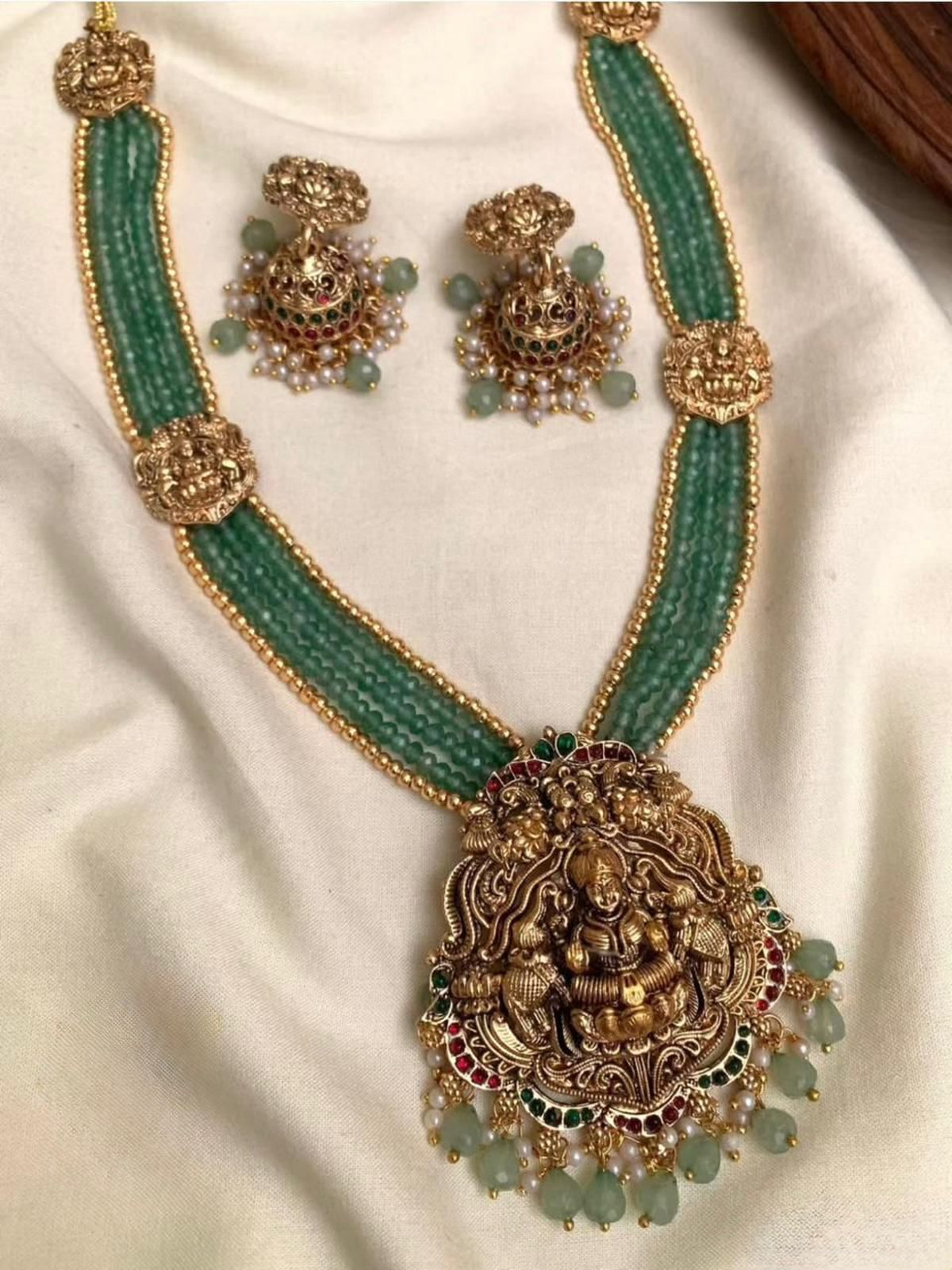 Jewel City Antique Gold-Plated Lakshmi Long Haram Set with Green Beads & Jhumkas – Traditional Temple Jewelry