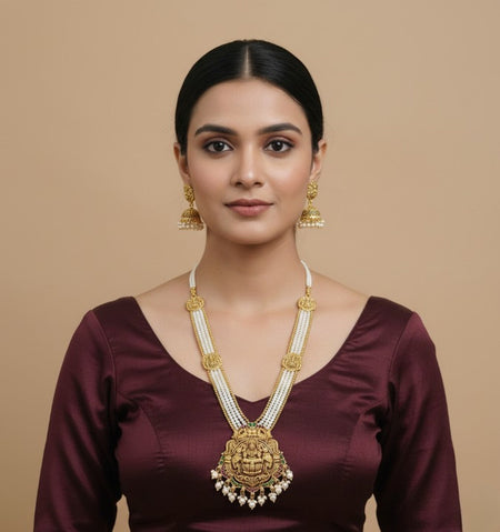 Jewel City Antique Gold-Plated Lakshmi Long Haram Set with White Beads & Jhumkas – Traditional Temple Jewelry
