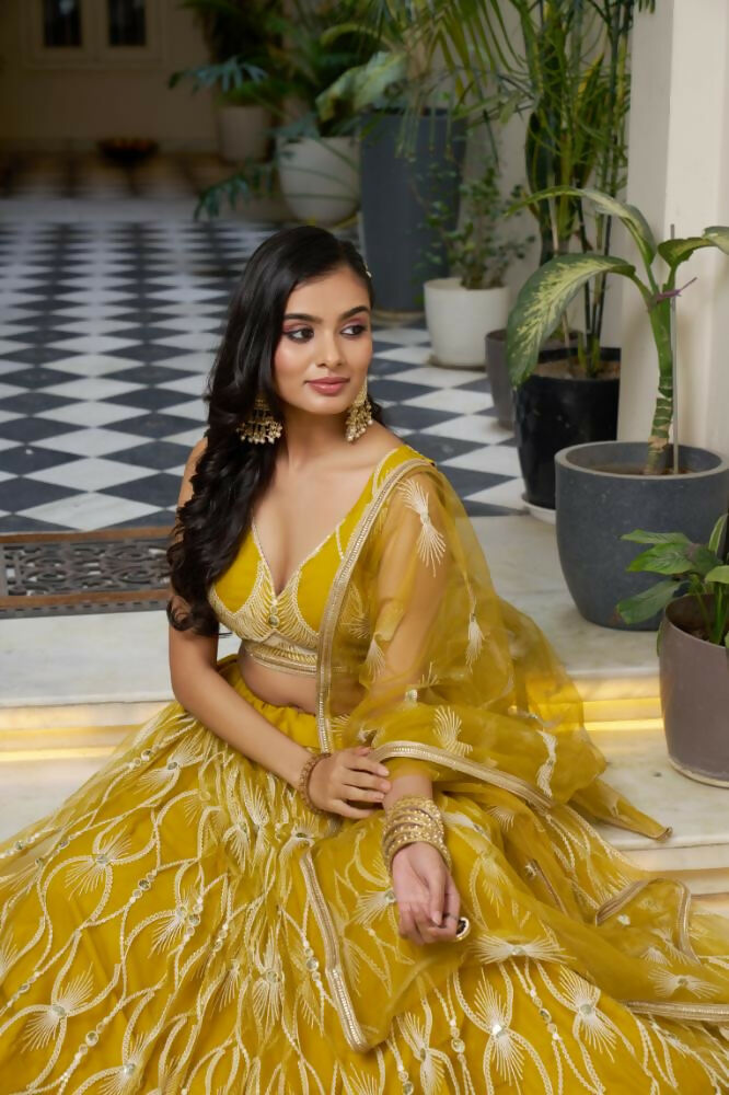 Aastha Fashion Mustard Yellow Butterfly Net White Cotton Thread Work And Sequence Work Embroidery Wedding Wear Lehenga Choli
