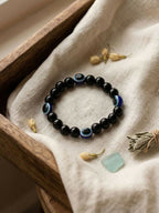 NVR Black Evil Eye Adjustable Bracelet for Men & Women - Distacart