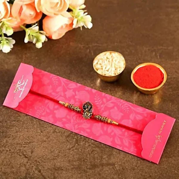Serene Lord Krishna Rakhi & Cashew Jar - Distacart