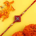 Sleek American Diamond Rakhi And Cashew Jar - Distacart