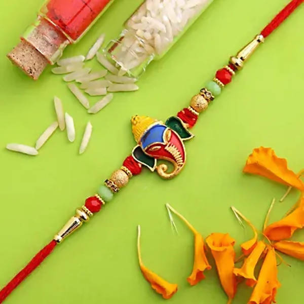 Divine Lord Ganesha Rakhi & Soan Papdi - Distacart