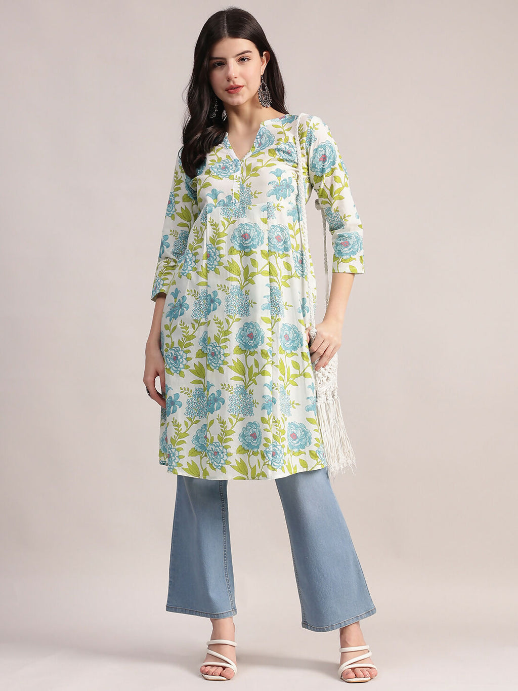 Aavyora Women's Off-White and Blue Cotton A-Line Tunic with Blue and Green Floral Print.