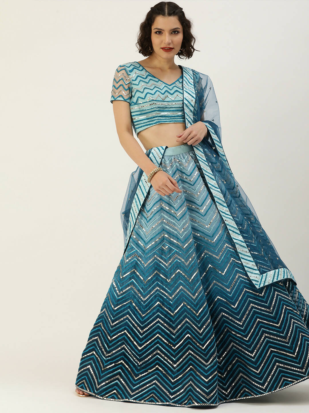 House of Panchhi Women Teal shading Net Mirror Embroidered Lehenga & Blouse with Dupatta