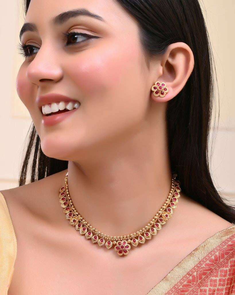 VOJ Gold-Polished Flower Shaped Ruby Stone Studded Jewellery Set