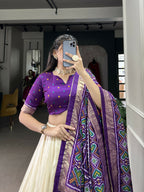Lorenvalley Offwhite and Purple Tussar Silk Patola Print Lehenga Choli