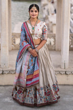 Vedant Vastram Fully Printed Pure Manipuri Silk Lehenga Choli With Blouse & Dupatta - Beige