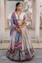 Vedant Vastram Fully Printed Pure Manipuri Silk Lehenga Choli With Blouse & Dupatta - Beige