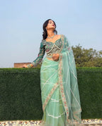 Teeya Creation Light Green Color Net Fabric Pearl Work Heavy Embroidery Work Saree