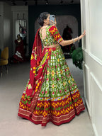 Lorenvalley Green Tussar Silk Patola Print With Foil Work And Original Mirror Gamthi Lace Lehenga Choli with Dupatta