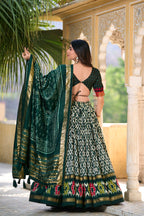 Lorenvalley Green Tussar Silk Ikkat Print With Foil Work Lehenga Choli with Dupatta