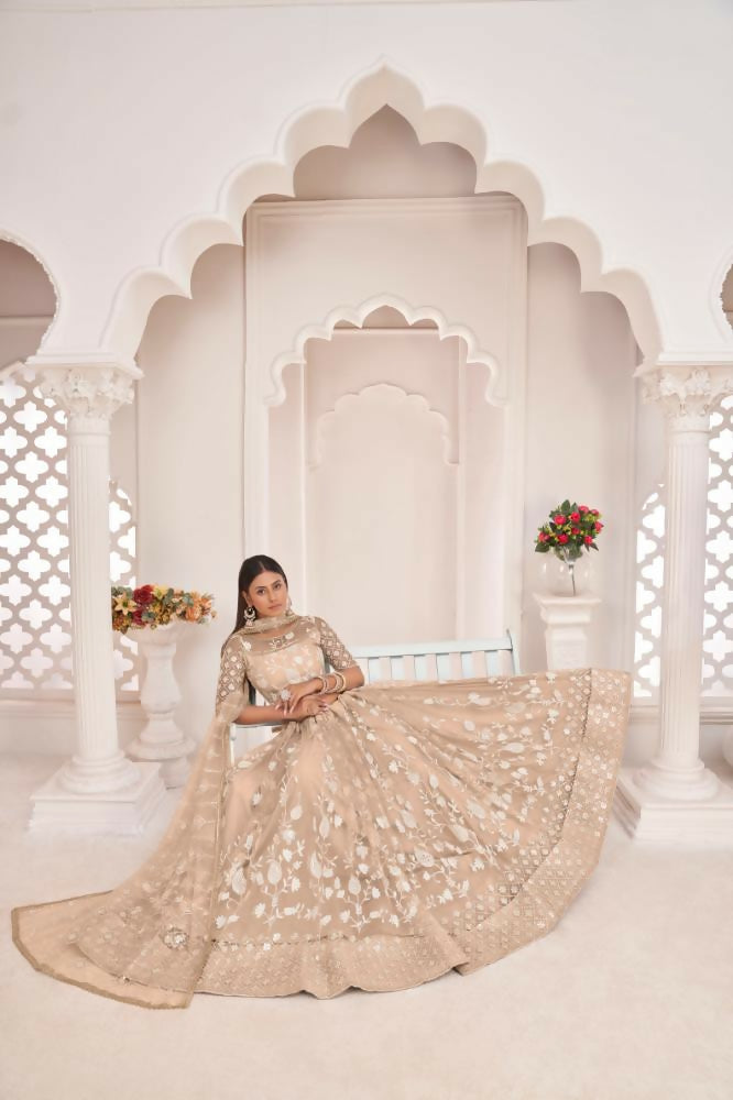Aastha Fashion Dusty Chiku Butterfly Net White Cotton Thread Work, Zari Work And Sandwich Sequence Work Embroidery Wedding Wear Lehenga Choli