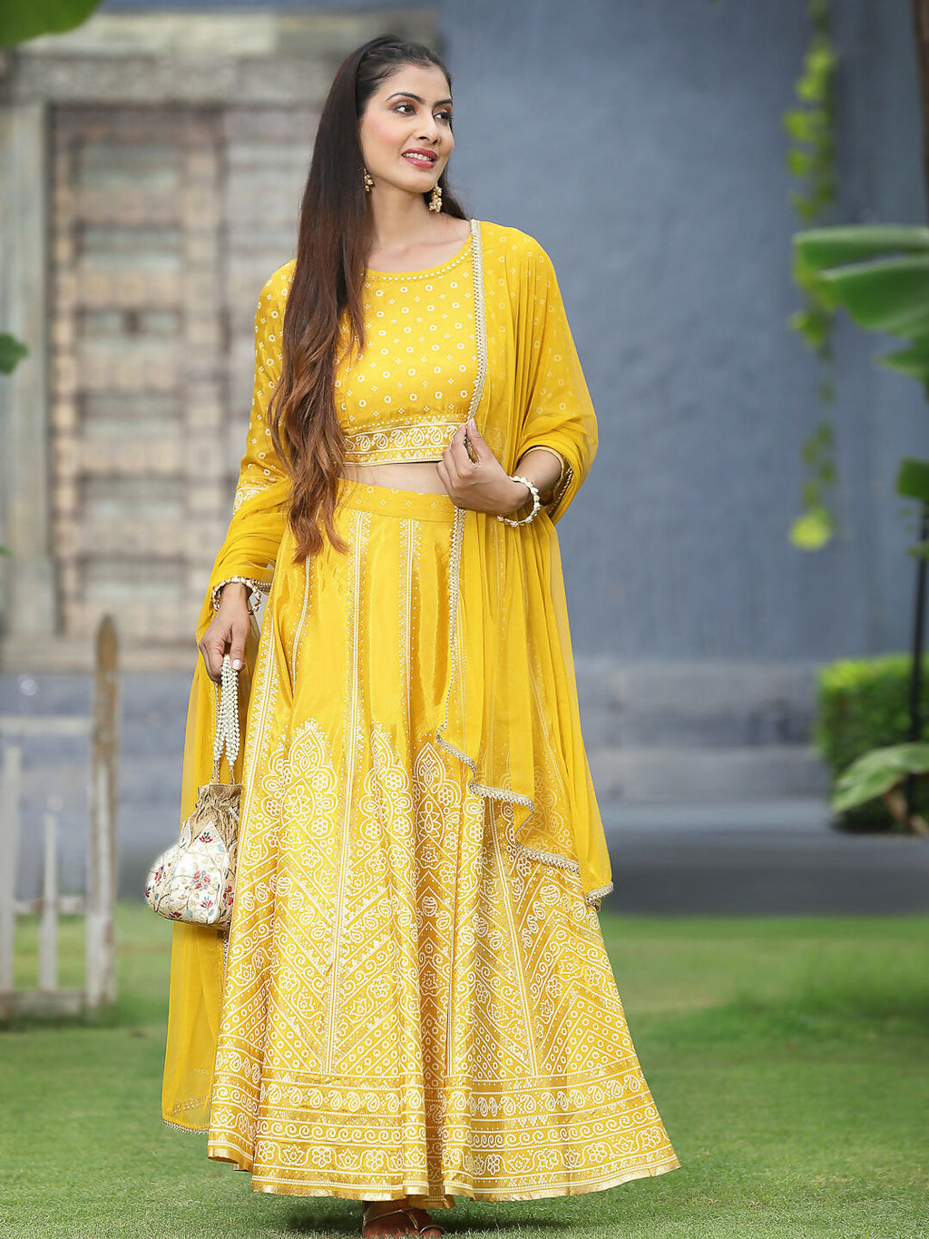 Juniper Mustard Bandhani Printed Shantoon Slub Lehenga Choli & Net Dupatta Set.