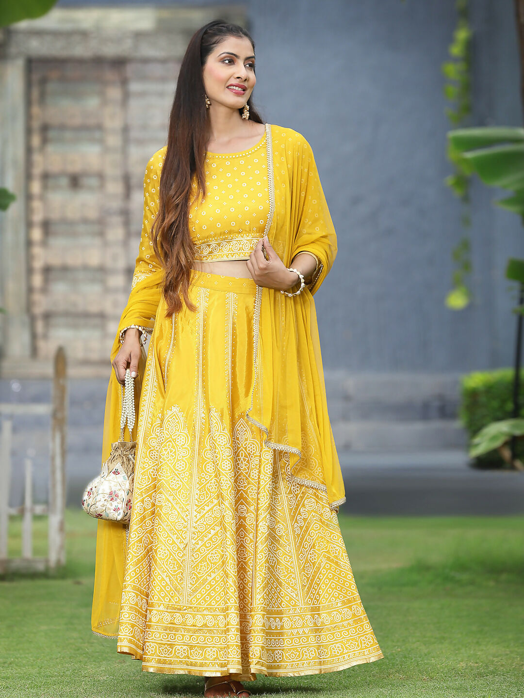 Juniper Mustard Bandhani Printed Shantoon Slub Lehenga Choli & Net Dupatta Set.