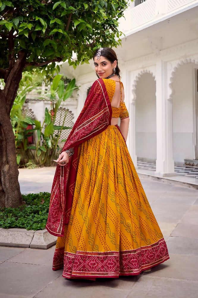 Evanik Yellow Tassa Silk With Bandhej Print Lehenga Choli - Distacart