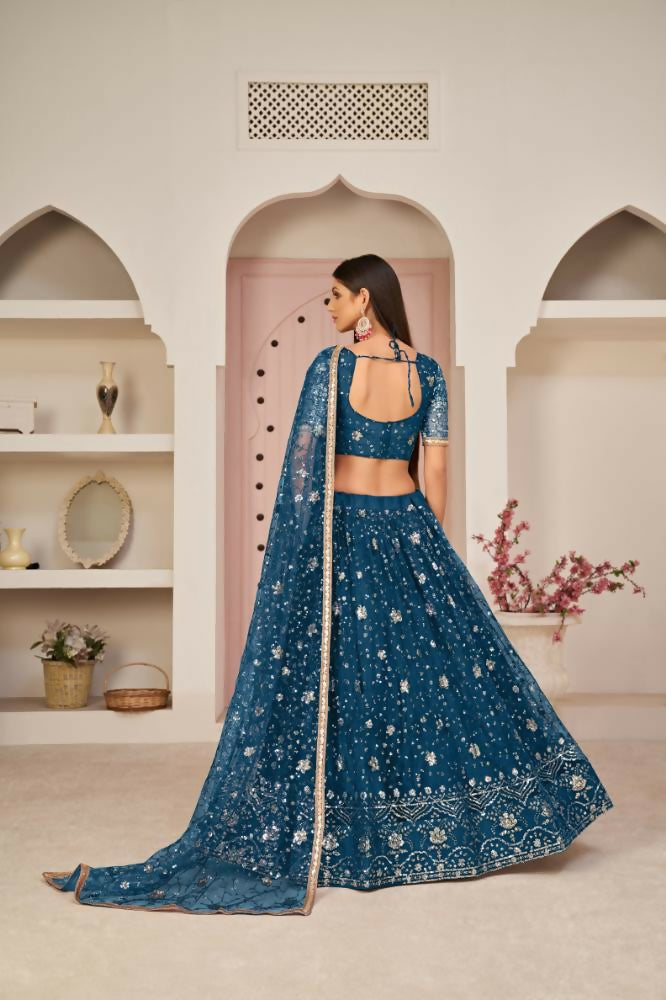 Aastha Fashion More Peach Butterfly Net All Over Thread Work, Zari Work And Sandwich Sequence Work Embroidery Wedding Wear Lehenga Choli